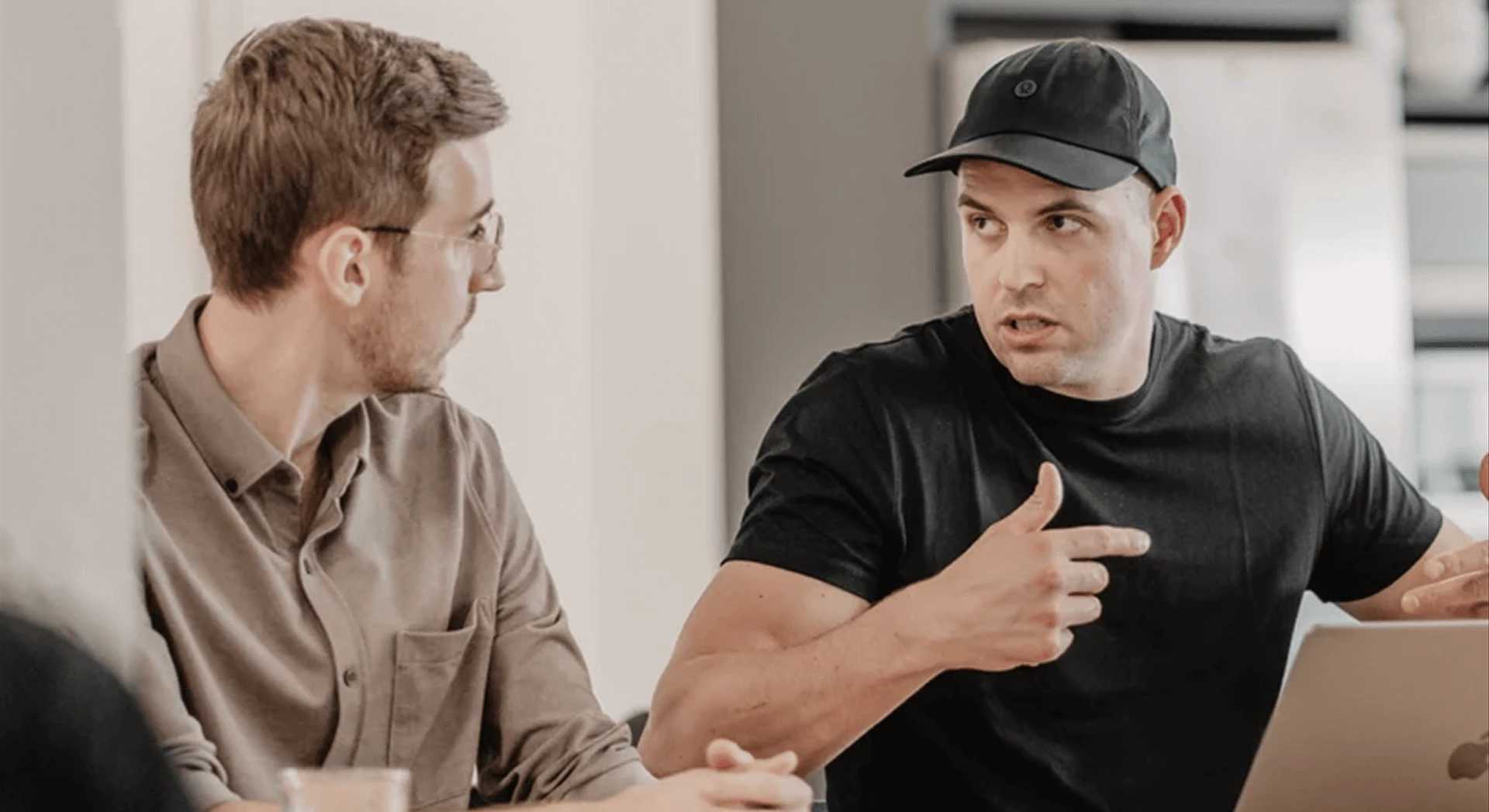 Two team members discussing