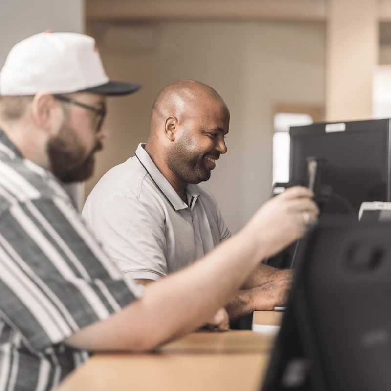 Photo of two team members collaborating