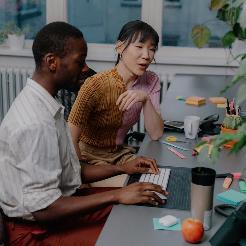 Photos of team members brainstorming